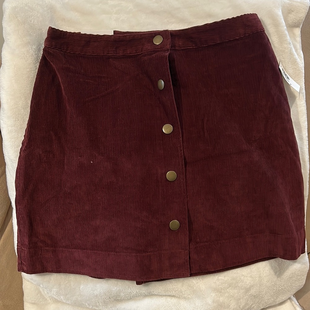 Old Navy maroon corduroy mini skirt, snaps to close, brand new never worn